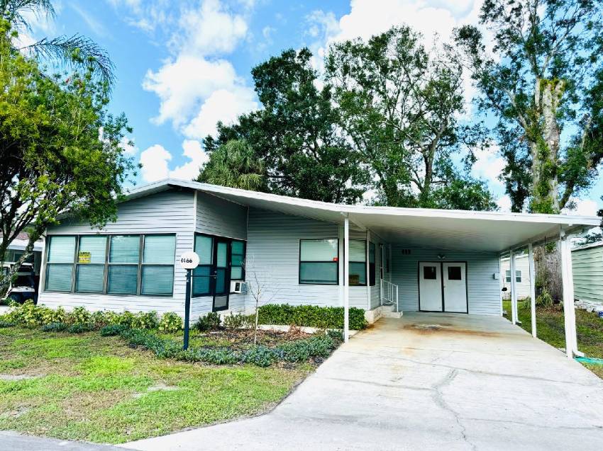 Lakeland, FL Mobile Home for Sale located at 4466 Alvamar Trail Schalamar Creek Golf & Country Club